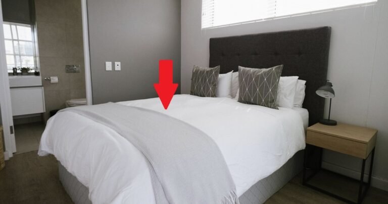 The Purpose of Fabric Strips on Hotel Beds