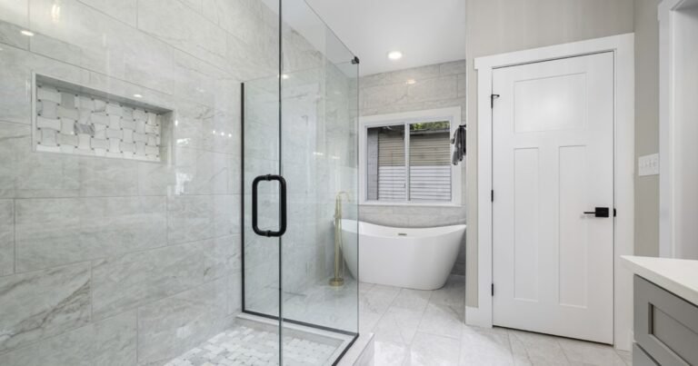 Why Do So Many Hotel Showers Have Only Half a Door?