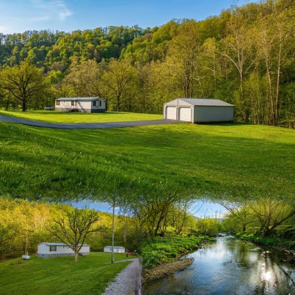57-Acre Country Retreat with Mobile Home and Hunting Land – $150,000 See Here