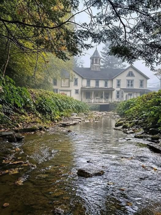 This Stunning Old House Sits Over a Peaceful Creek—and the View Is Simply Magical