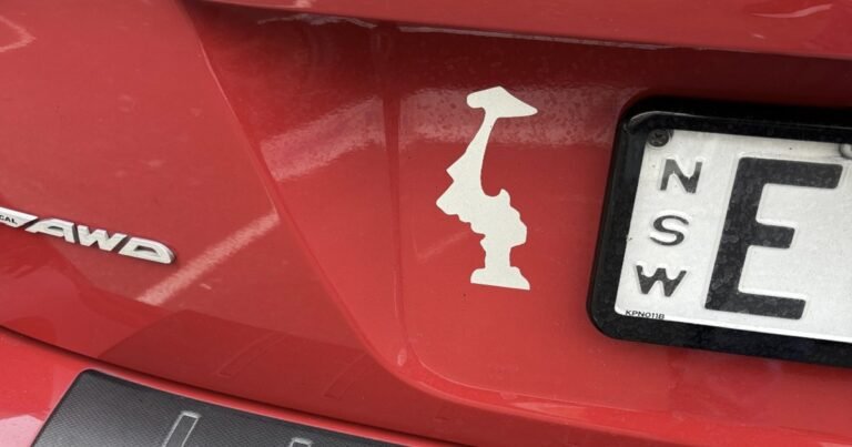 Why Drivers Display This Upside-Down Sticker on Their Cars