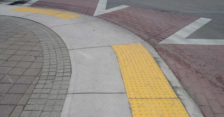 The Actual Purpose Of Those Colorful Sidewalk Bumps