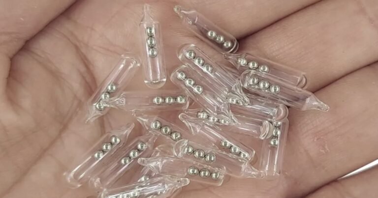 Identifying Small Glass Tubes Containing Three Tiny Ball Bearings